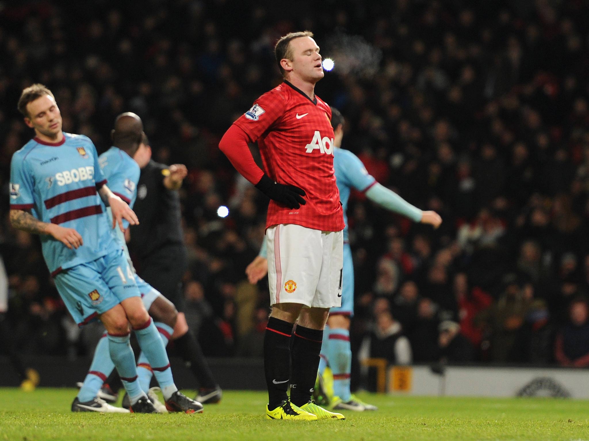 Wayne Rooney blasts the ball over the bar from the penalty spot against West Ham
