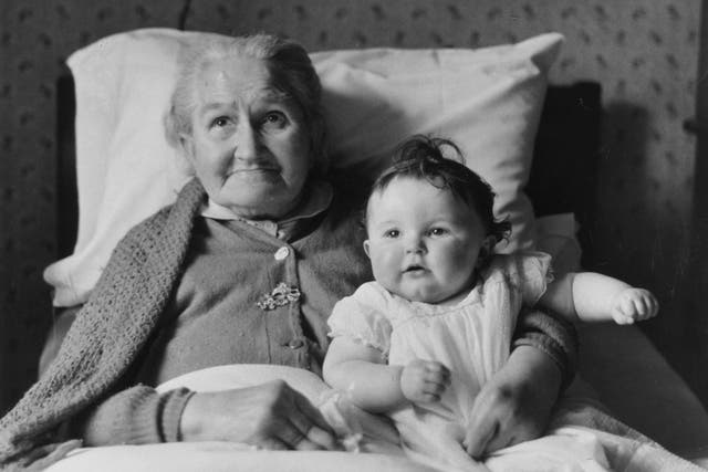 26th February 1959: Eighty three year old Mrs Margaret Roberts with her eight month old great-great-granddaughter.