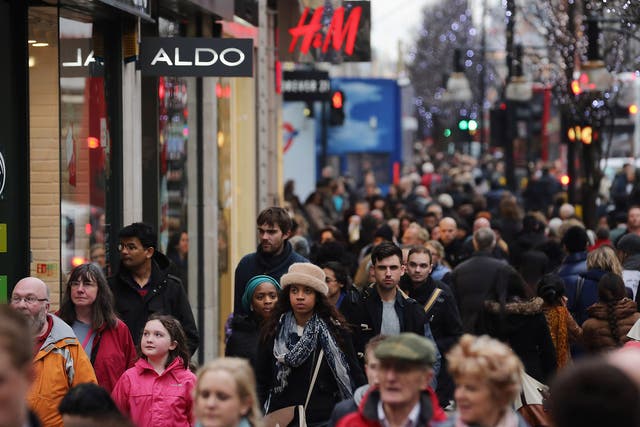 Not enough: shoppers make their way down Oxford Street on 24 December 2012 in London