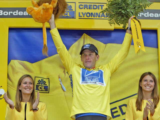 Lance Armstrong wears the yellow jersey of the Tour de France leader as he claims his fifth title. He was later stripped of all seven