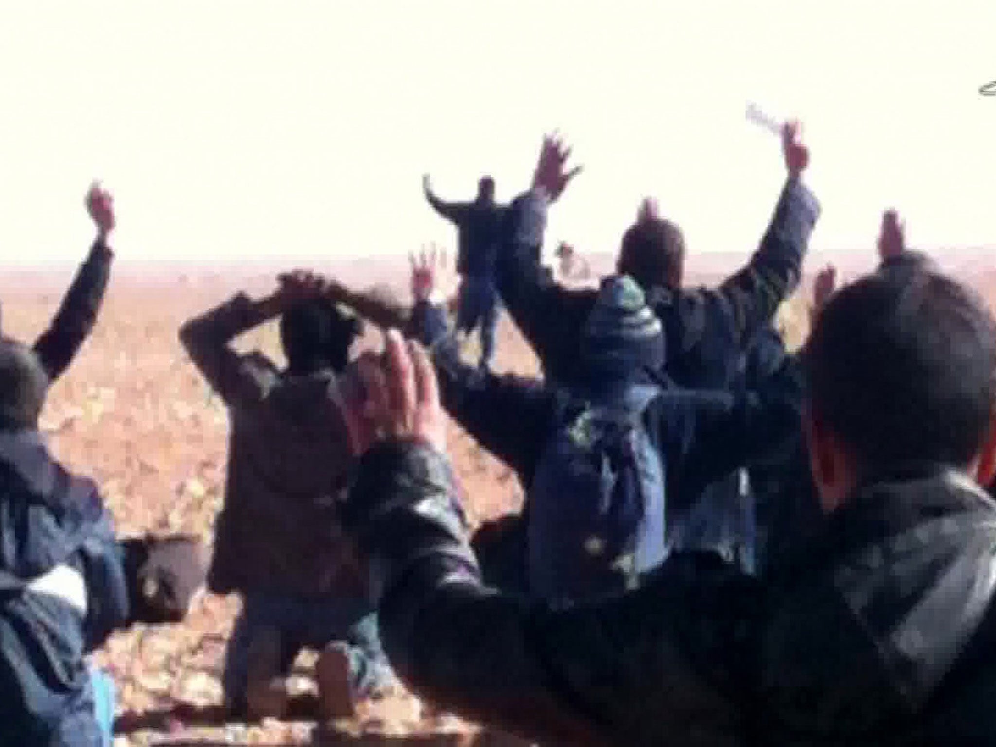 Desert capture: Algerian TV footage shows plant workers surrendering to the terrorists