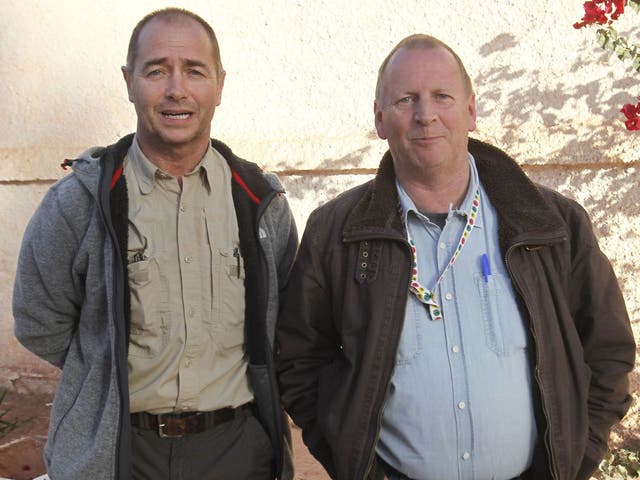 Freed British hostages, identified only as Peter and Alan, near the site at In Amenas, Algeria, yesterday 