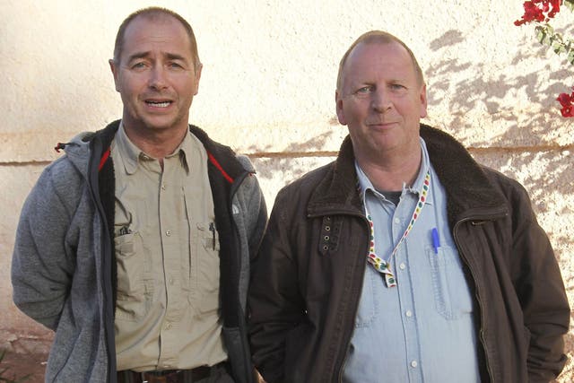 Freed British hostages, identified only as Peter and Alan, near the site at In Amenas, Algeria, yesterday 