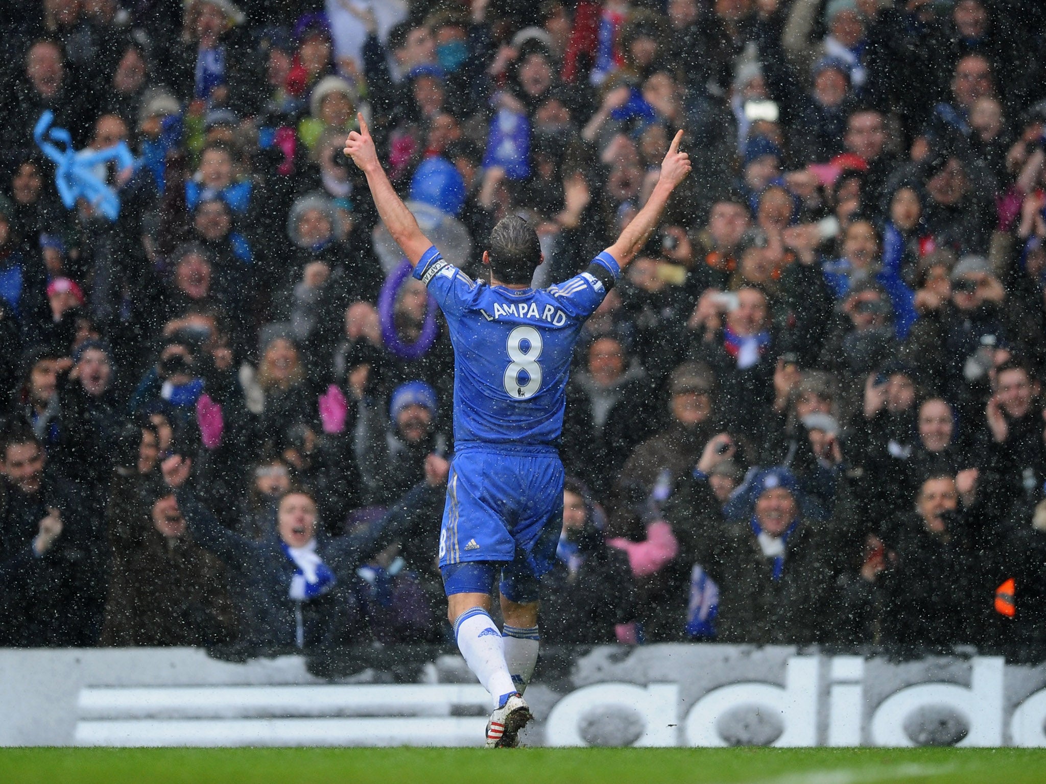 Frank Lampard celebrates scoring his penalty