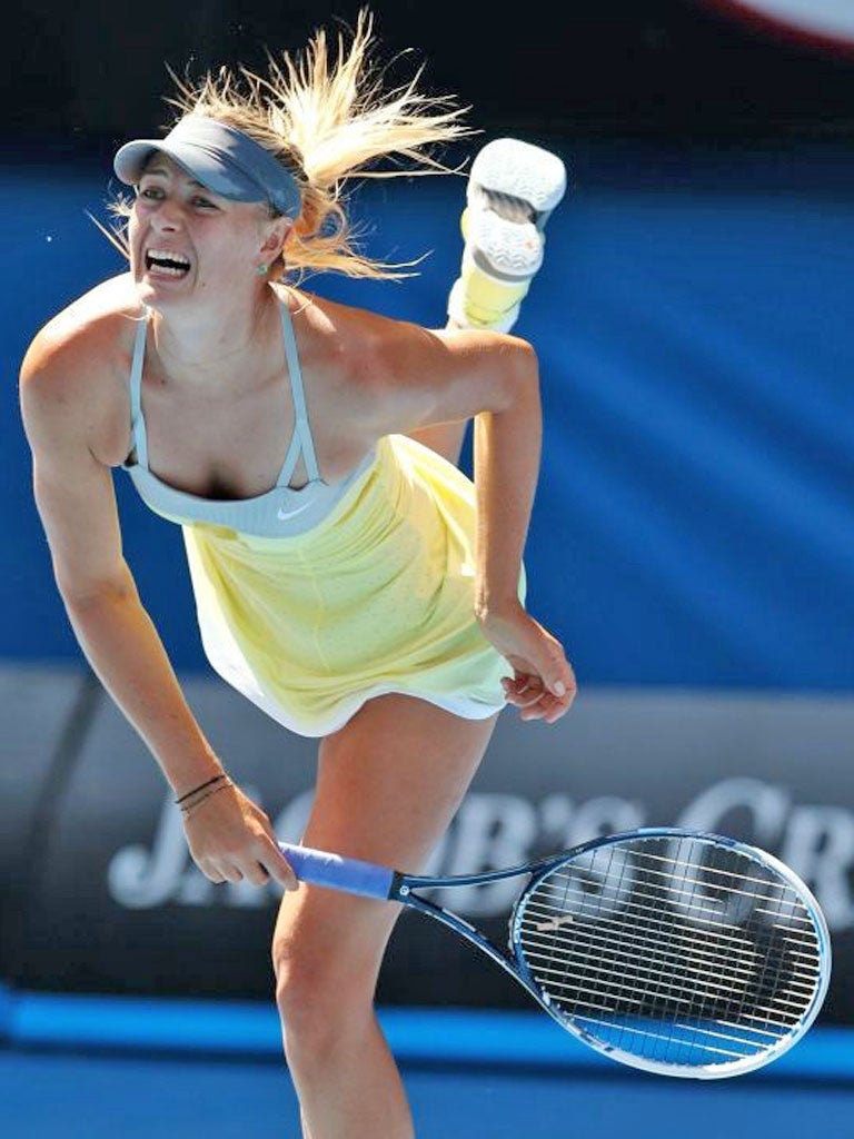 Maria Sharapova serves during her win over Kirsten Flipkens
