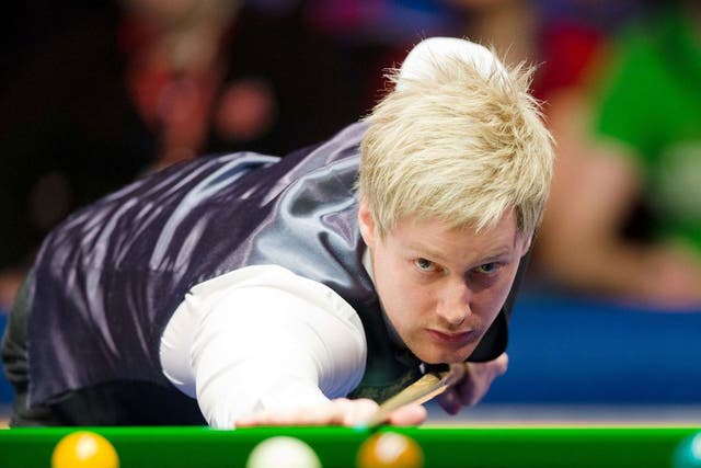 Neil Robertson lines up a shot during yesterday’s final