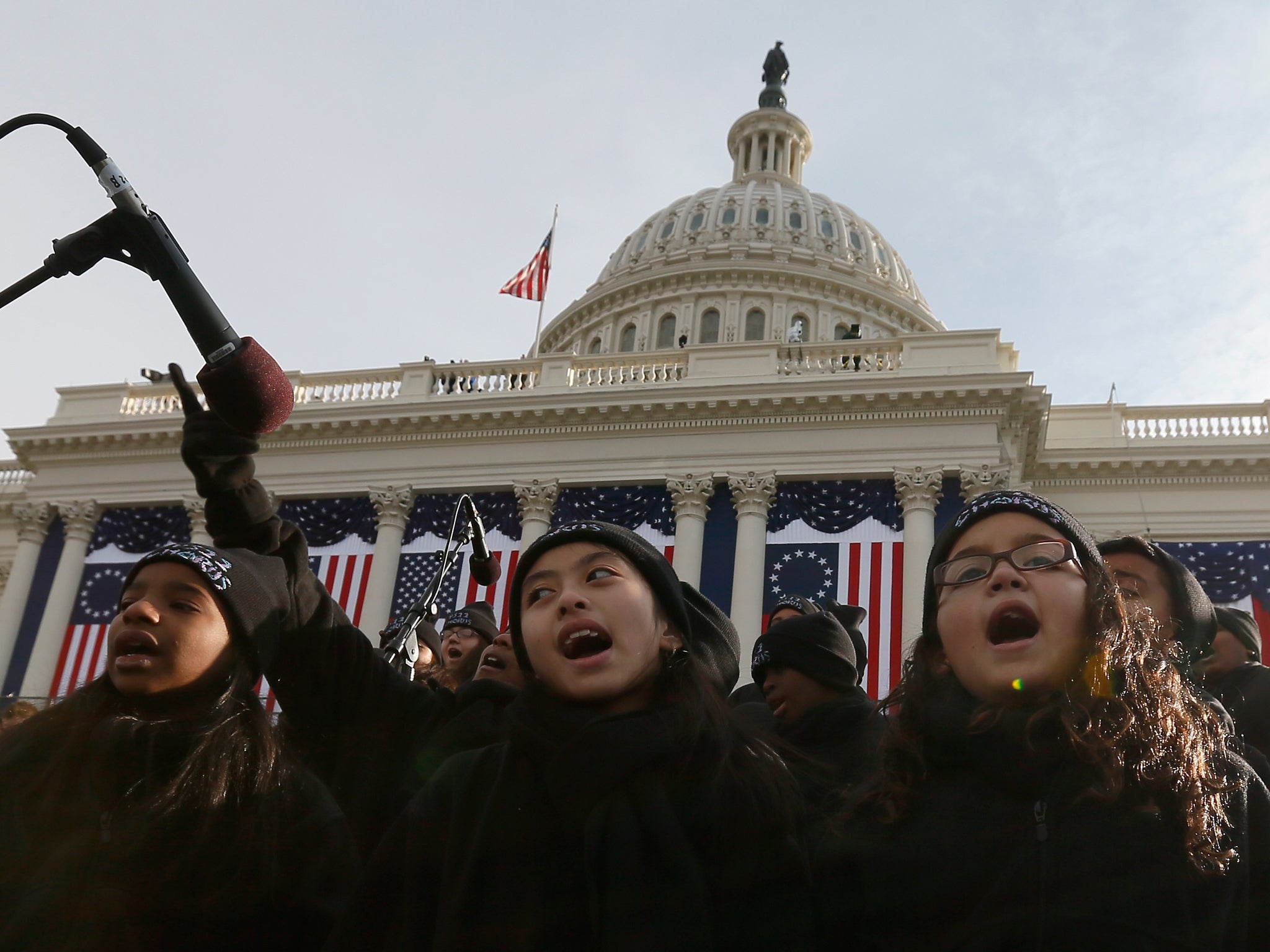 The PS 22 choir from Staten Island, New York perform during the presidential inauguration on the West Front of the US Capitol