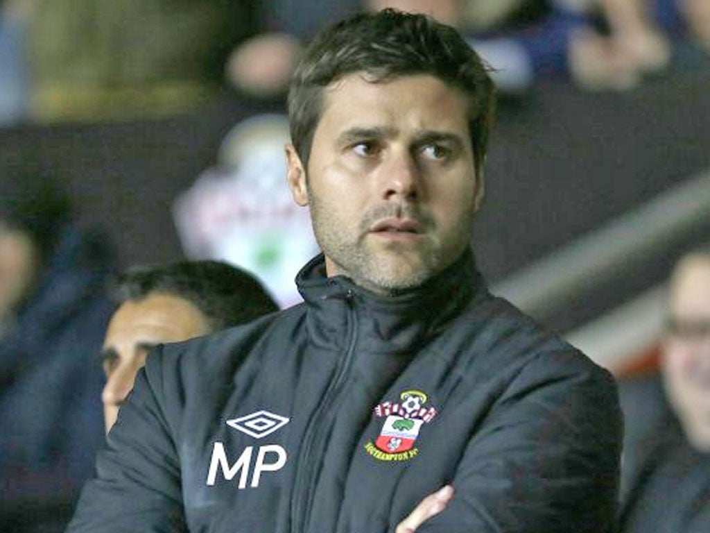 Southampton's new manager Mauricio Pochettino looks out from the technical area prior his teams game against Everton