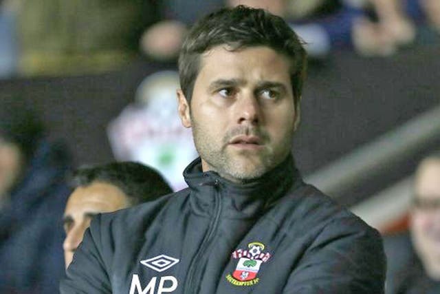 Southampton's new manager Mauricio Pochettino looks out from the technical area prior his teams game against Everton