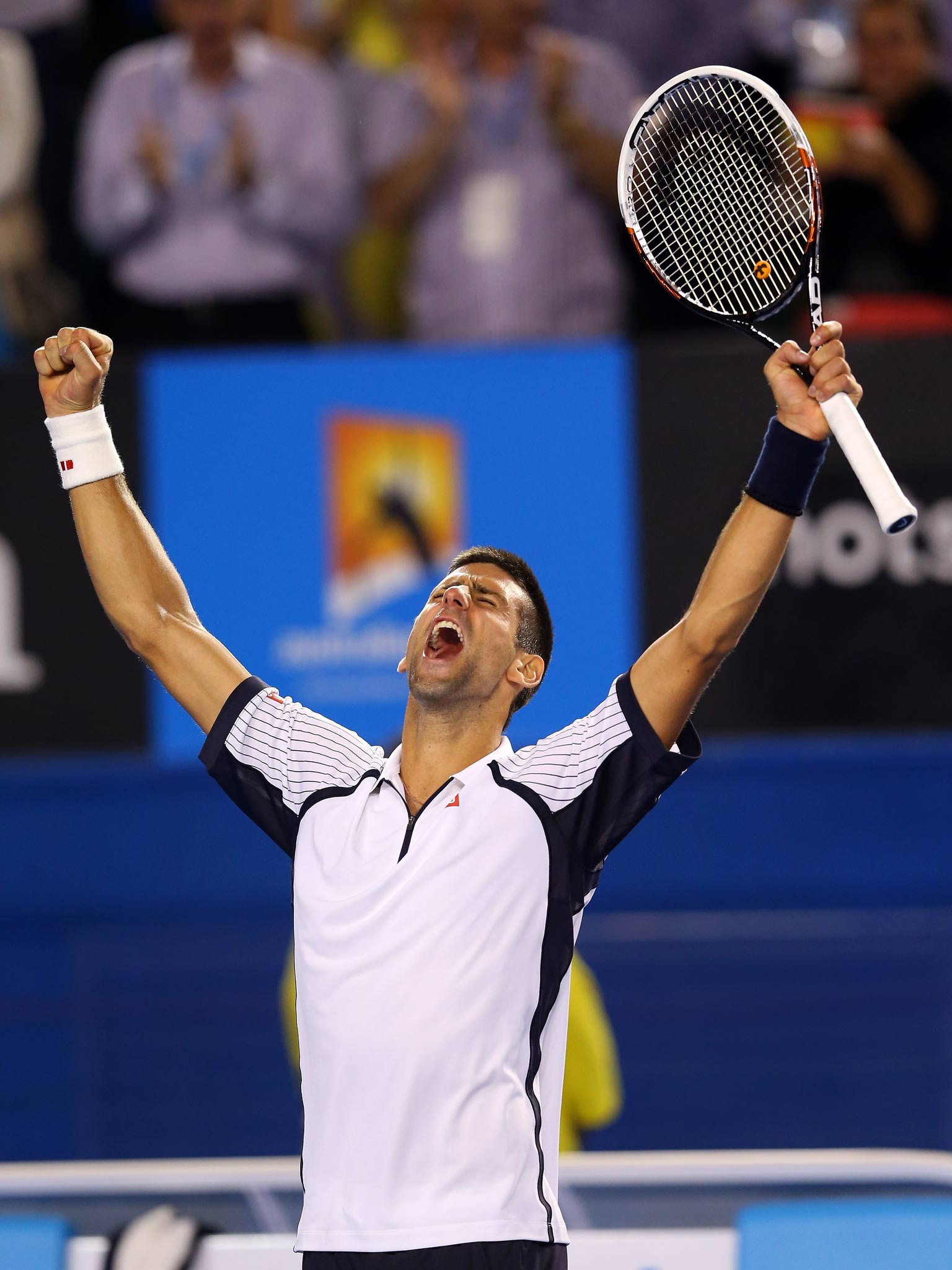 Novak Djokovic celebrates after reaching the Australian Open semi-finals