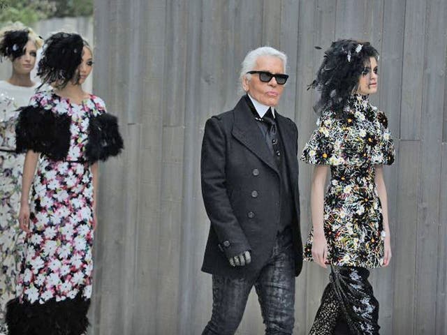 Designer Karl Lagerfeld walks the runway with models during the Chanel Spring/Summer 2013 Haute-Couture show as part of Paris Fashion Week at Grand Palais