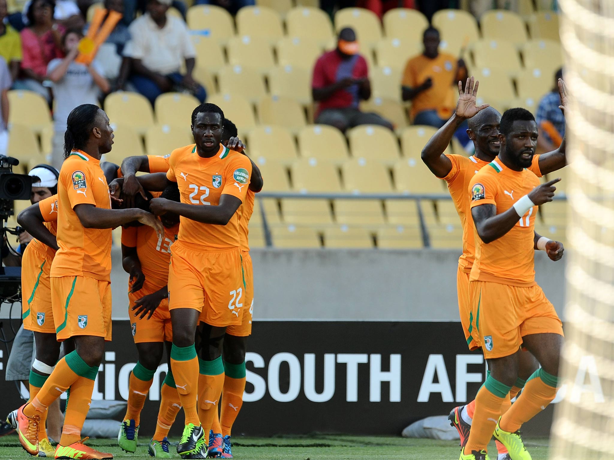 Didier Drogba and Ivory Coast celebrate Yaya Toure's goal