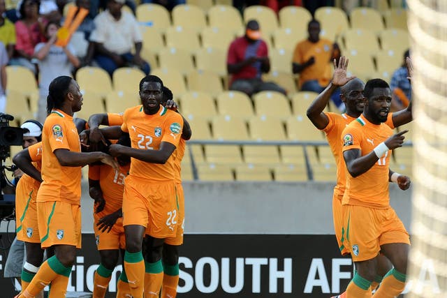 Didier Drogba and Ivory Coast celebrate Yaya Toure's goal
