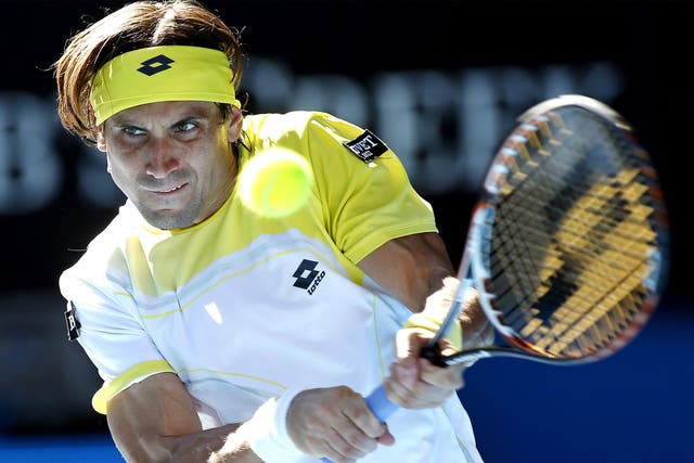 David Ferrer plays a backhand during his five-set victory yesterday