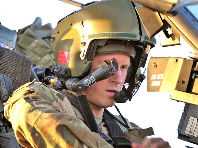 Prince Harry at the controls of an Apache helicopter