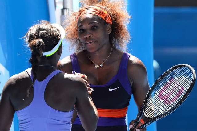 Serena Williams of the US shakes hands with Sloane Stephens following her exit from the Australian Open