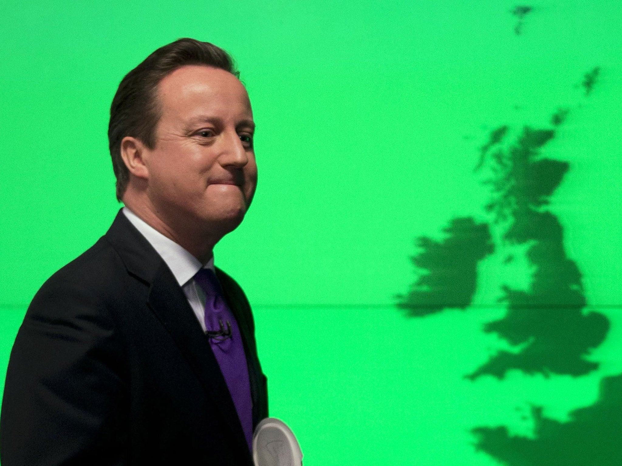 Prime Minister David Cameron walks off stage after his speech on Europe