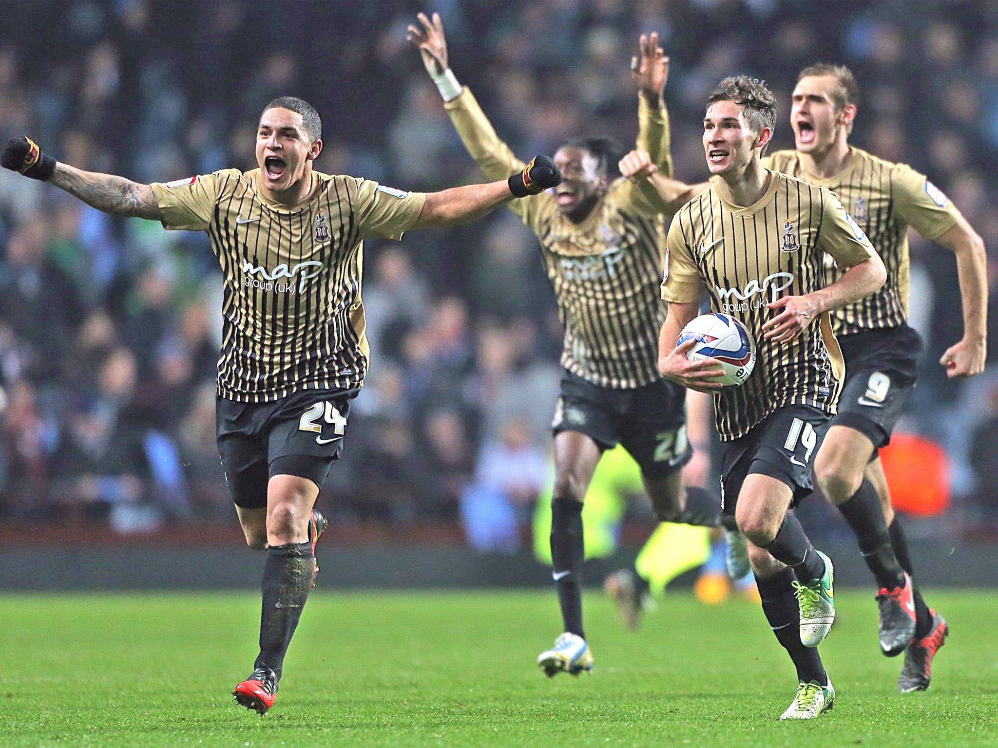 Bradford’s players celebrate their famous win