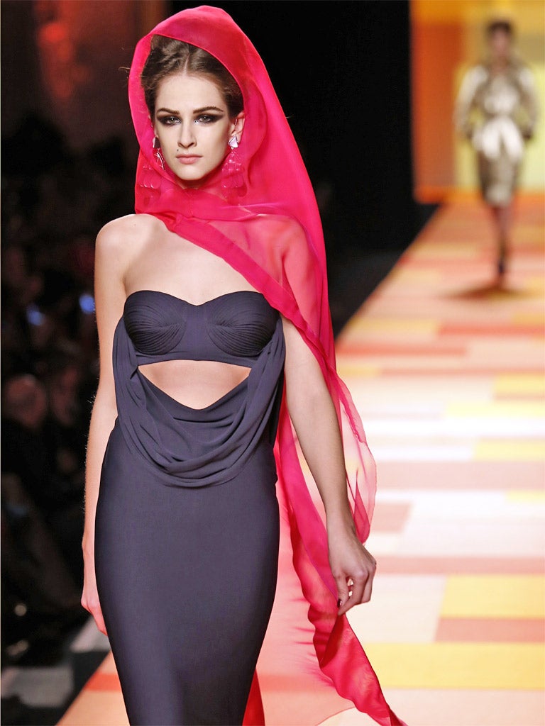 A model presents a creation by French designer Jean Paul Gaultier during the Haute Couture Spring-Summer 2013 collection show