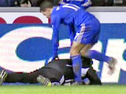 TV still shows Eden Hazard kicking the Swansea ball boy