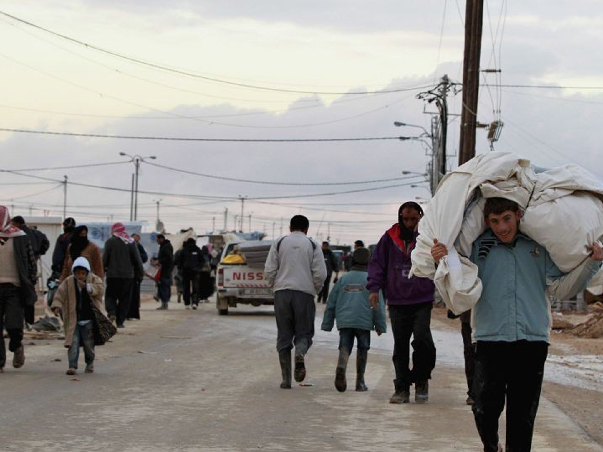 Syrian refugees at the Al-Zaatari camp in the Jordanian city of Mafraq