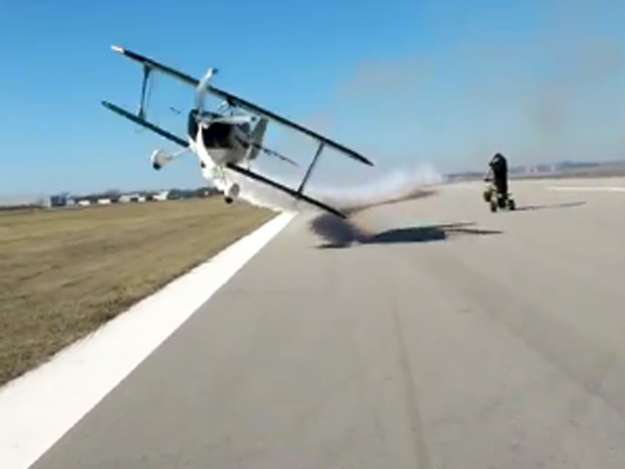 The moment the plane flies perilously close