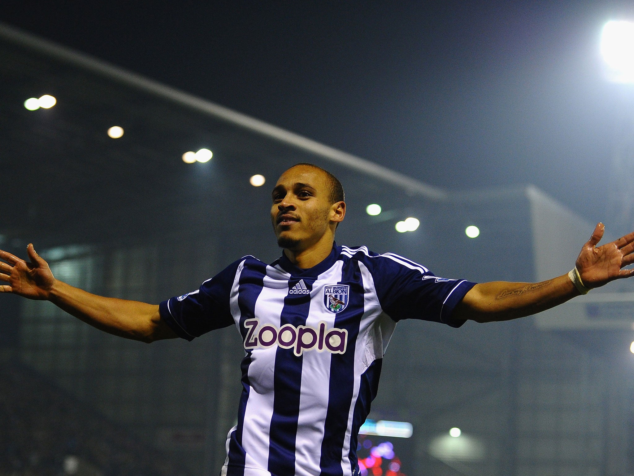 Peter Odemwingie of West Bromwich Albion celebrates scoring