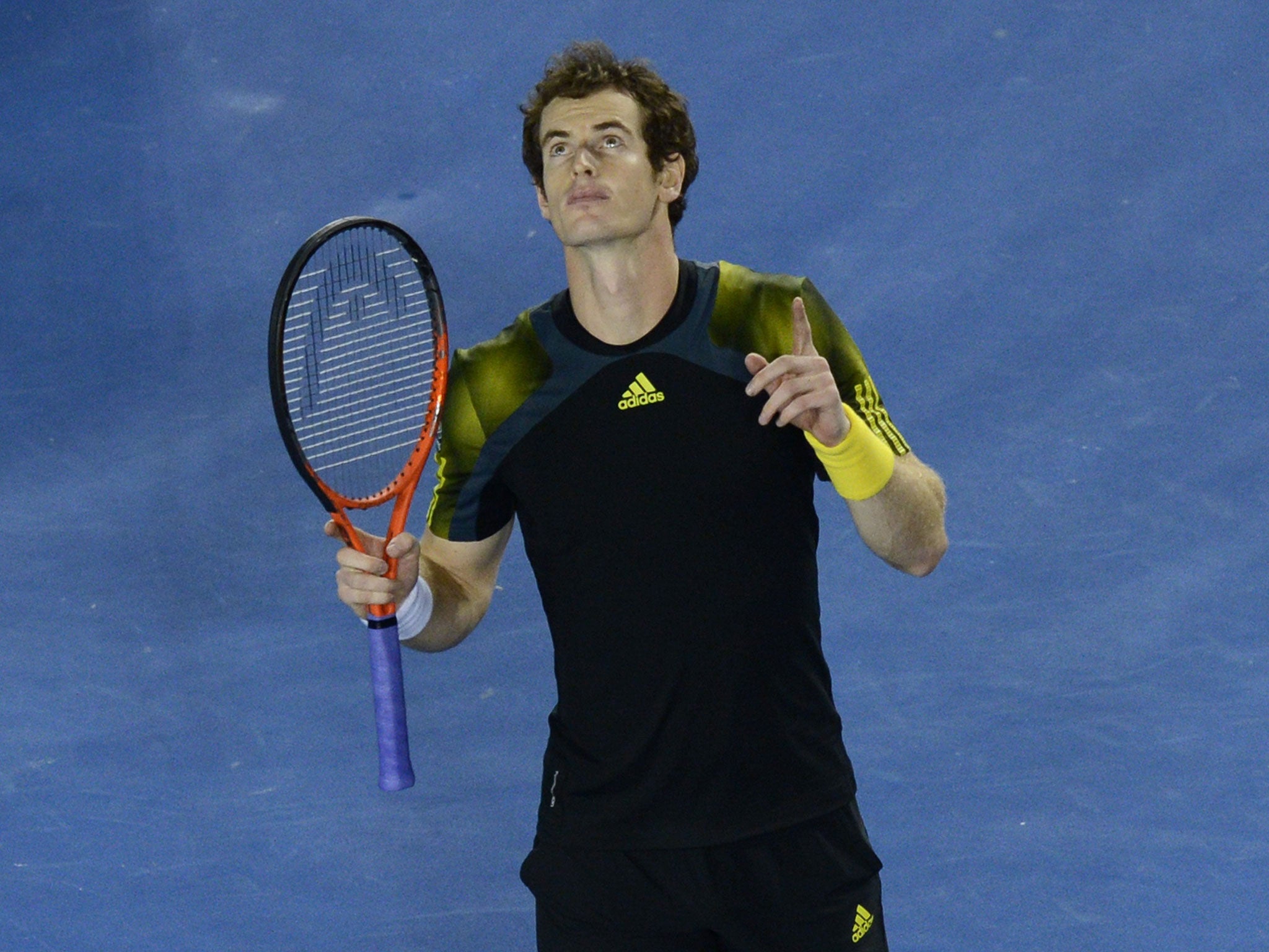Andy Murray keeps his eye on the ball during his five-set win over Roger Federer