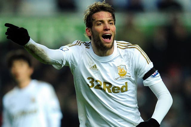 Swan on high: Michu has been told by Spain coach Vicente del Bosque he will be included in the squad next month  