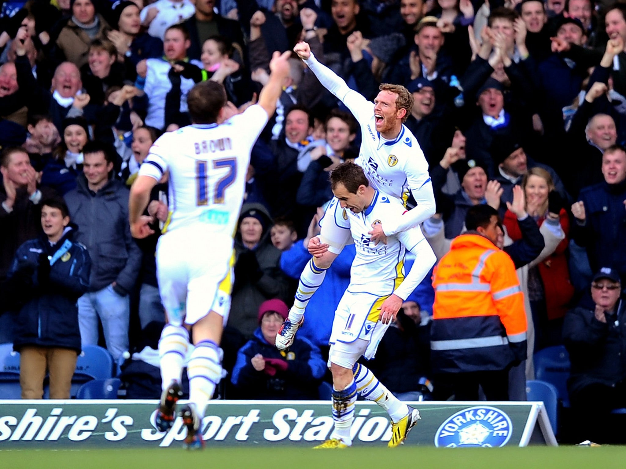 Luke Varney celebrates his goal which counted as Leeds' second