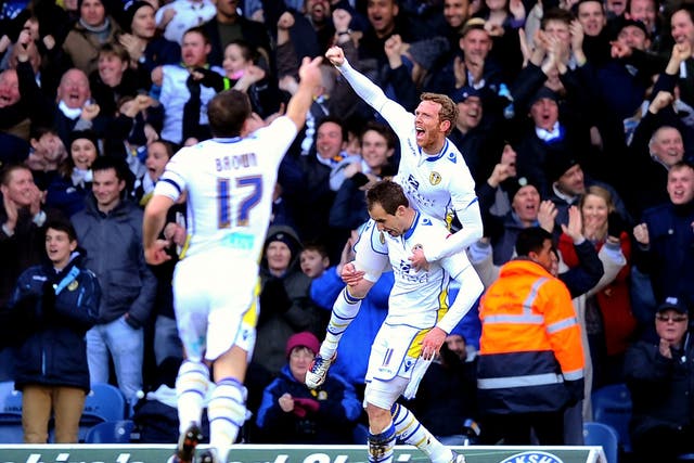 Luke Varney celebrates his goal which counted as Leeds' second