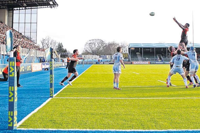 Saracens and Cardiff contest a line-out on the artificial turf