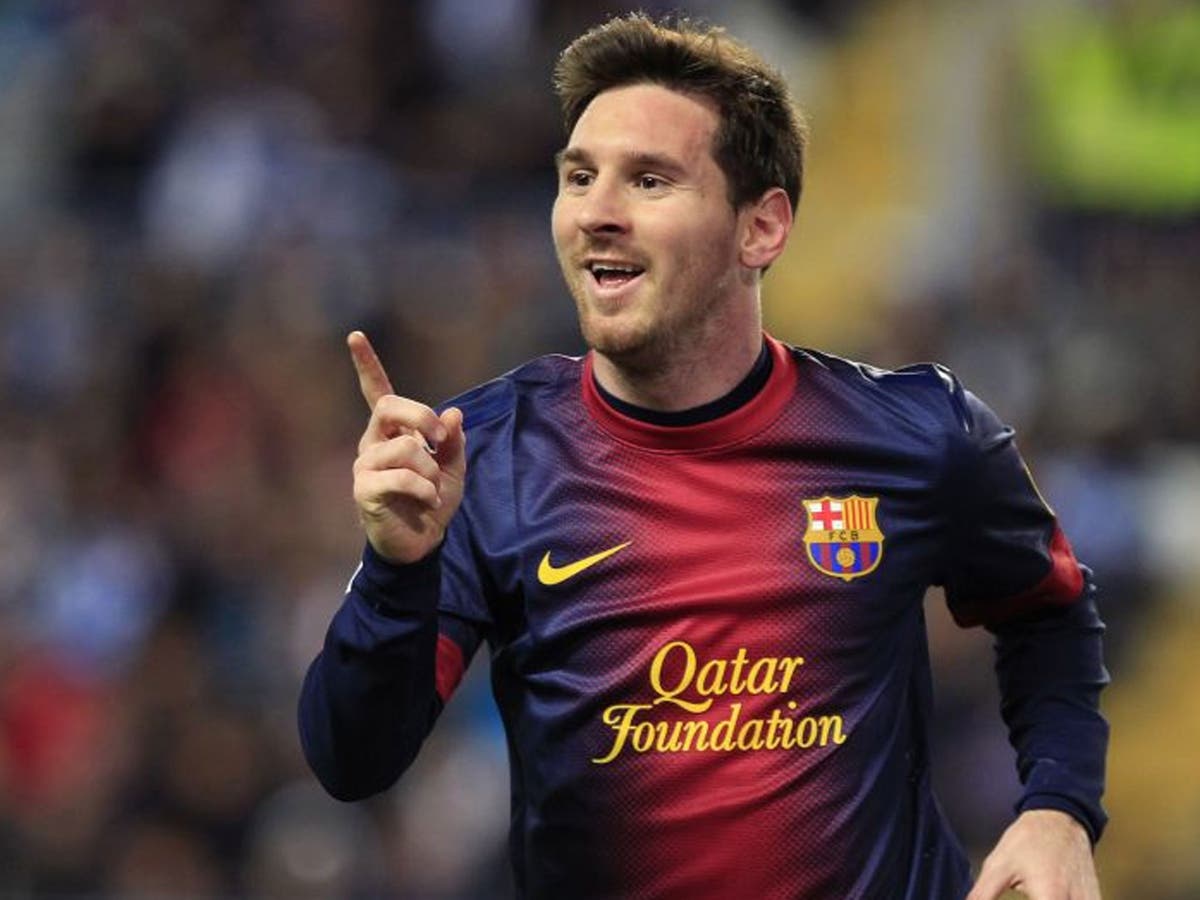 Lionel Messi formally signs two-year contract extension with Barcelona ...