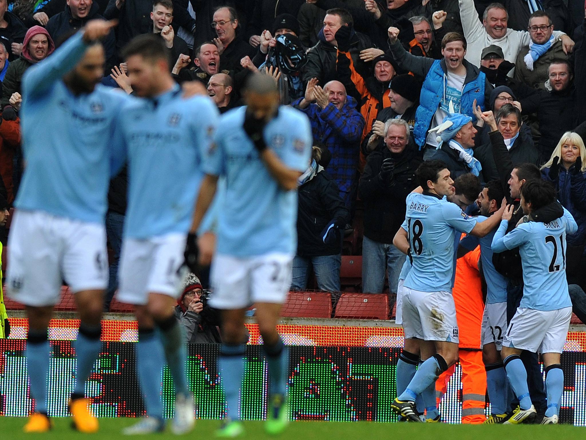 Pablo Zabaleta is congratulated on his late goal for Manchester City against Stoke
