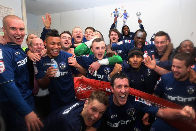 Oldham celebrate their FA Cup victory over Liverpool