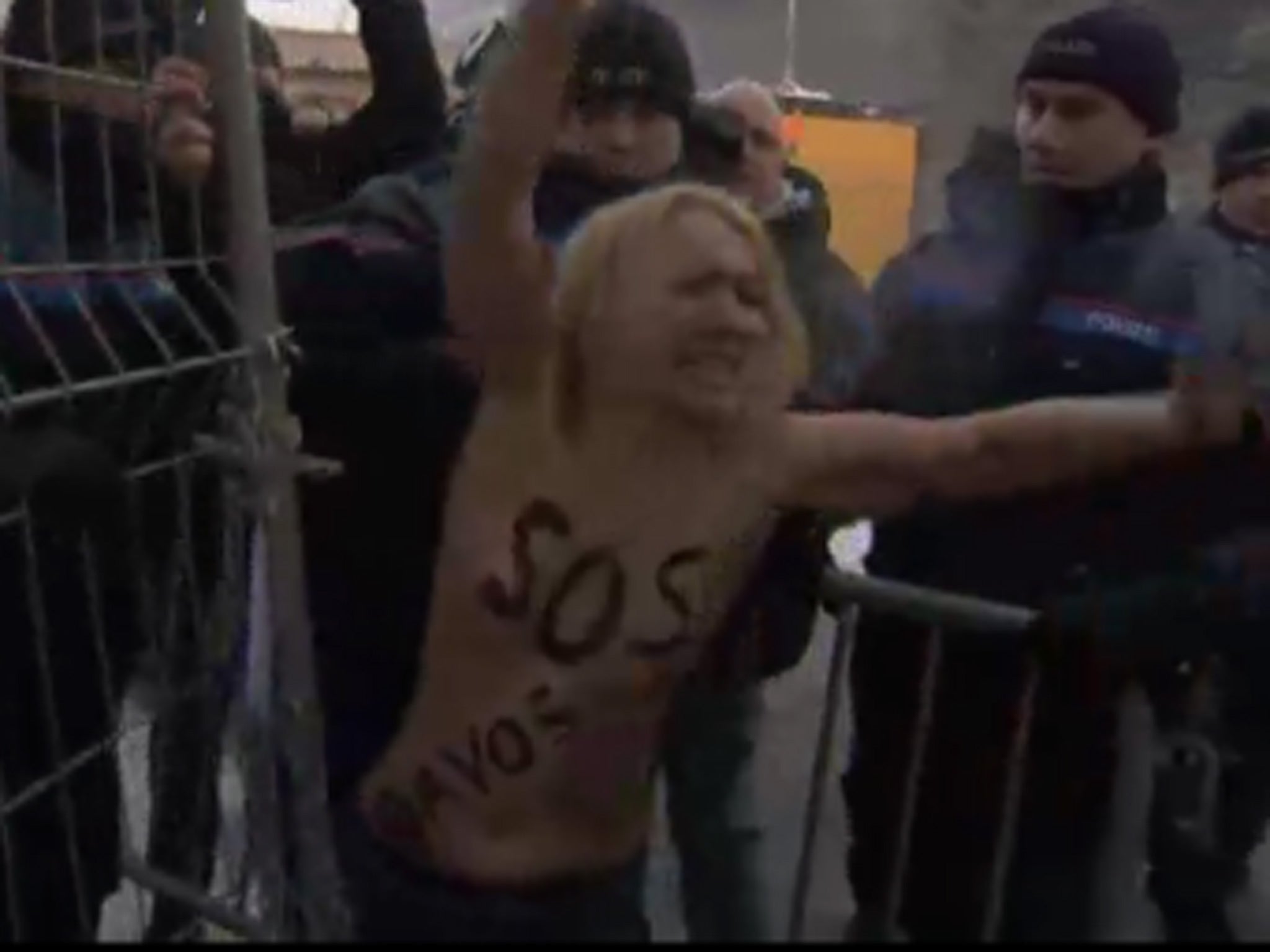 A member of FEMEN protesting in Davos