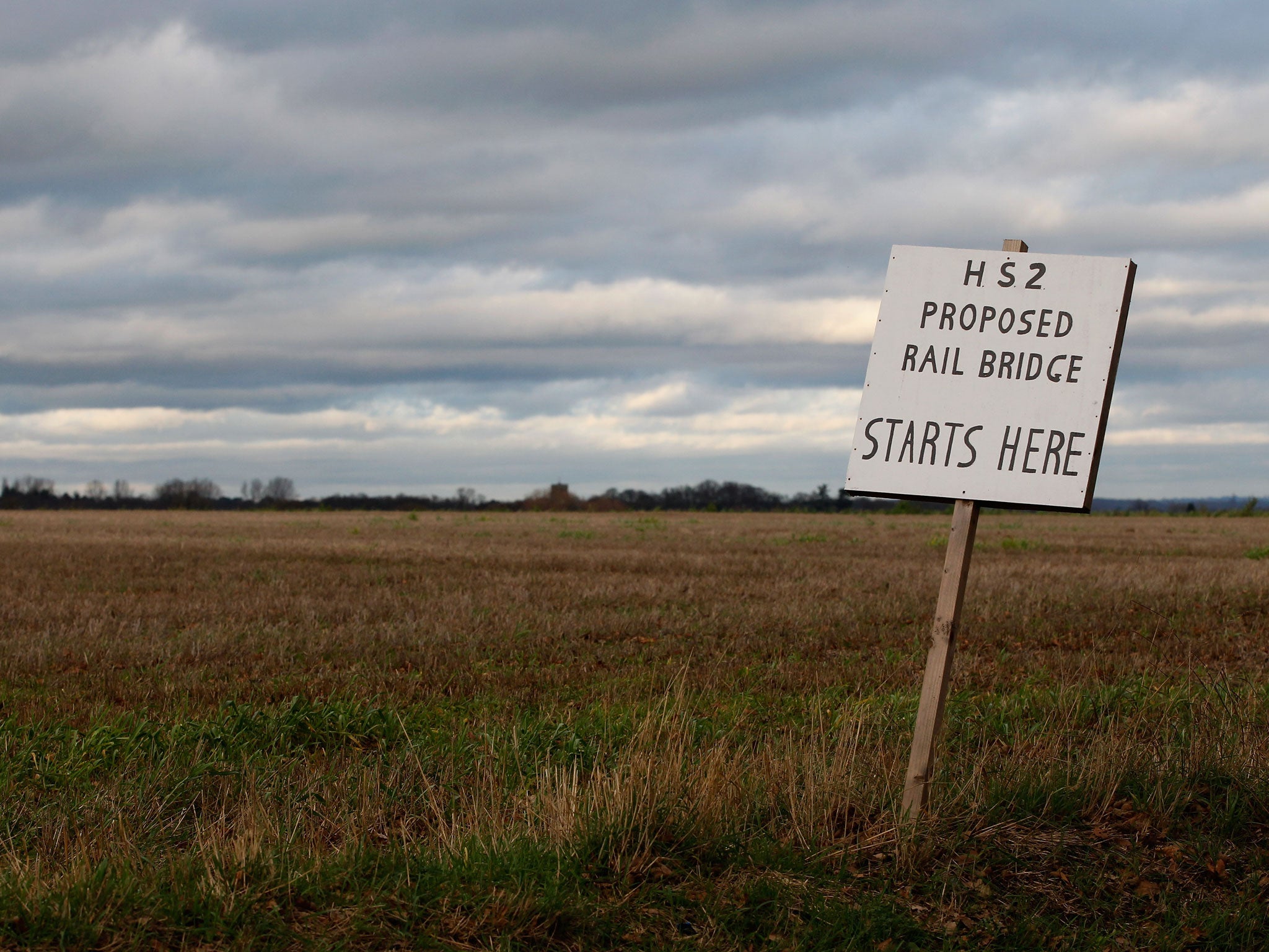 A placard erected by protesters marks the spot where a new rail bridge is proposed to be built across the countryside for the new HS2 high speed train link at the village of Middleton in Staffordshire on January 10, 2012 in Middleton, United Kingdom.