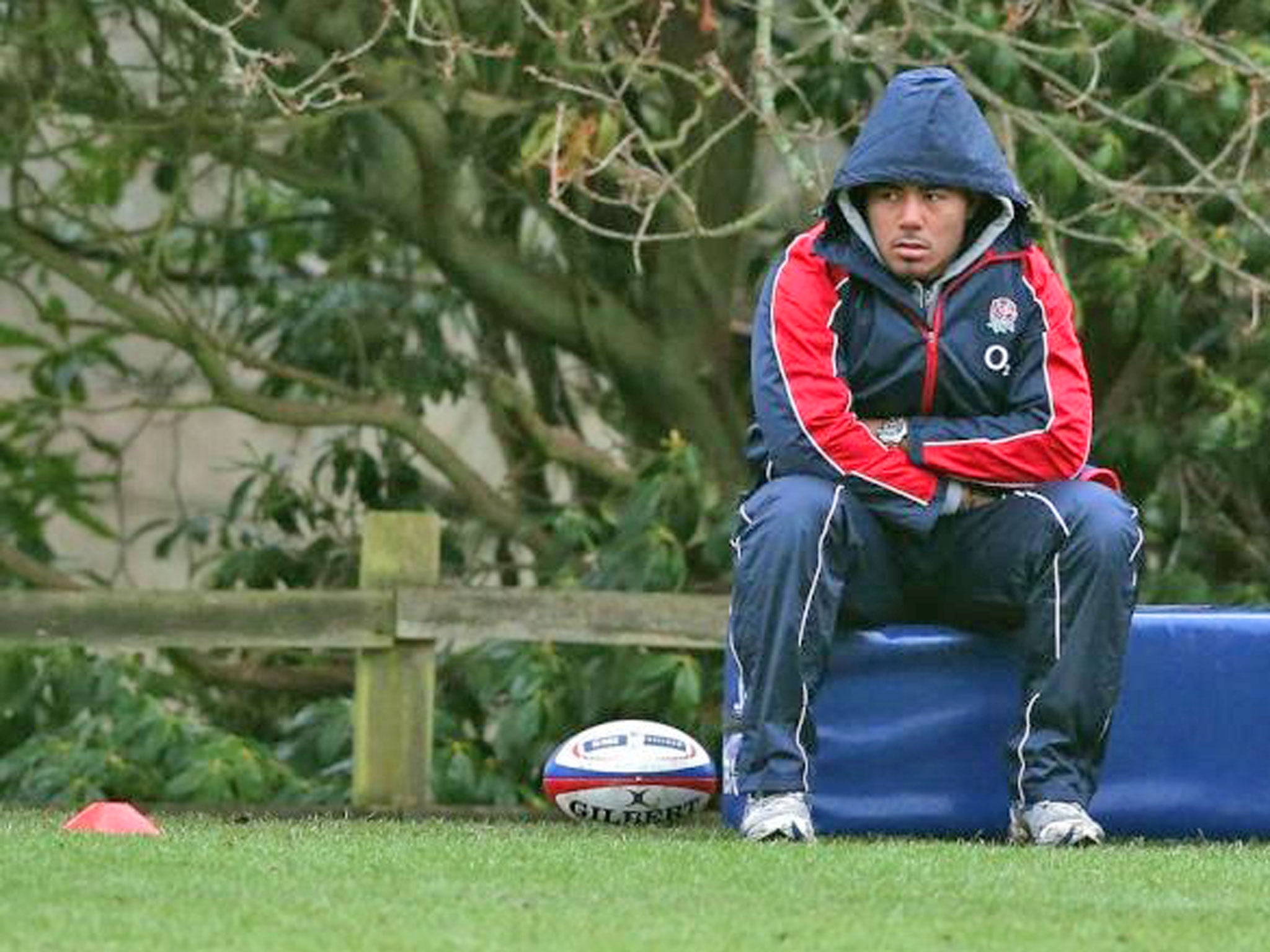 Manu Tuilagi watches England training from the sidelines