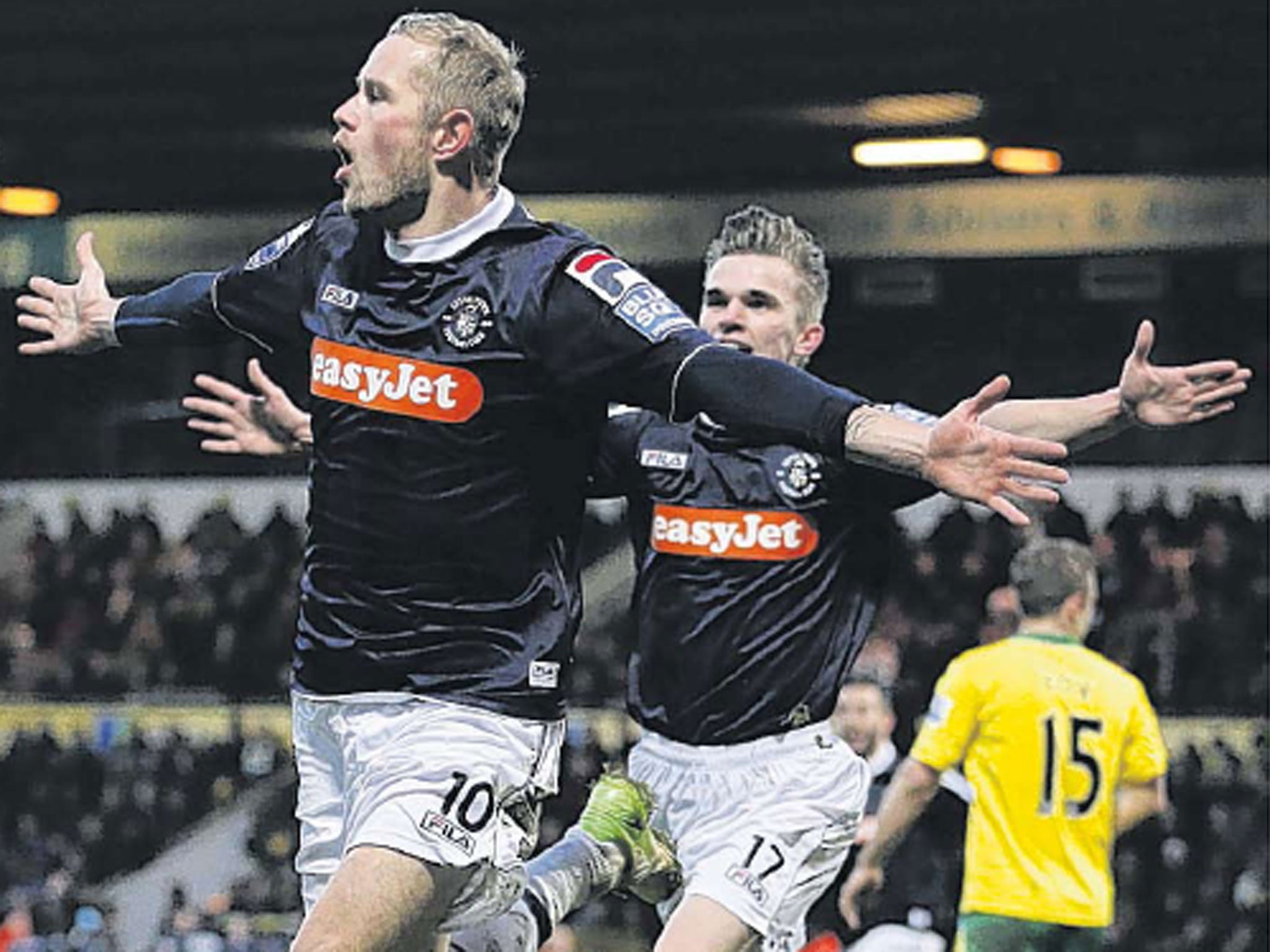 Scott Rendell celebrates his goal at Norwich that gave Luton a historic win