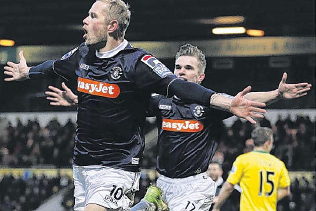 Scott Rendell celebrates his goal at Norwich that gave Luton a historic win