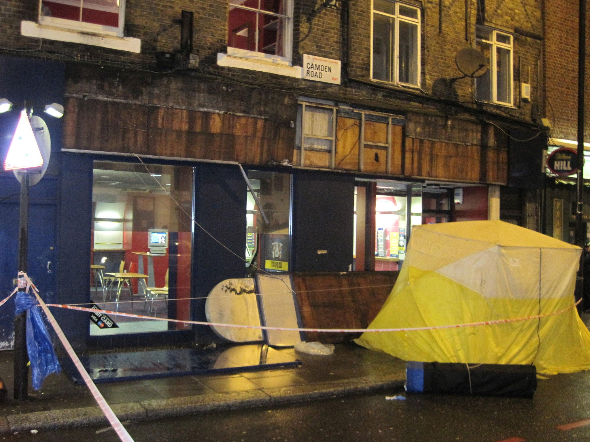 The scene outside the Camden Road William Hill betting shop, after a man was killed by a falling sign