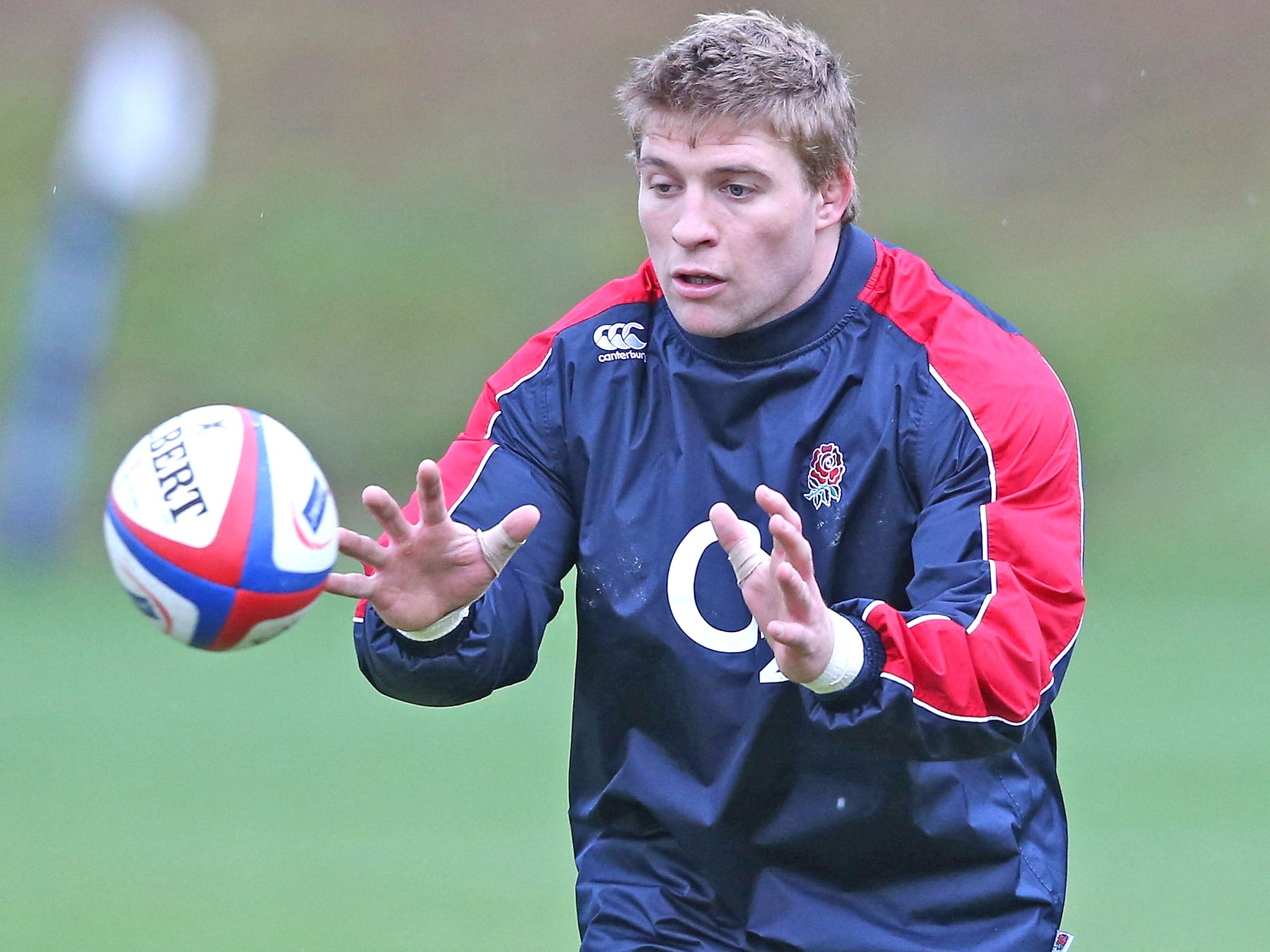 Tom Youngs catches the ball during an England training session on Monday