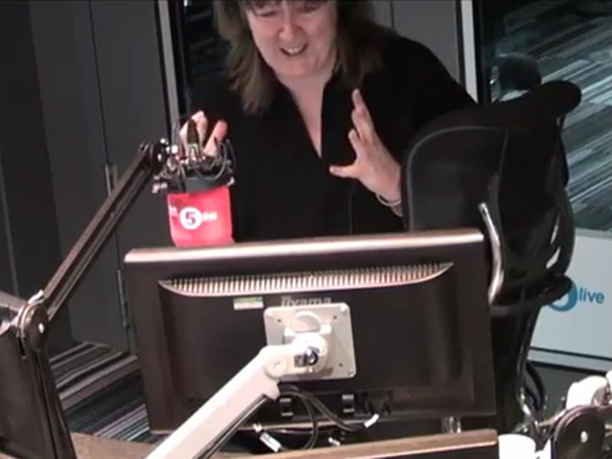 BBC 5Live presenter Shelagh Fogarty gets flustered after a mouse in spotted in the studio