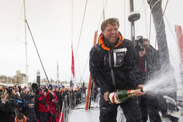 Alex Thomson celebrates third place in the Vendée Globe singlehanded round the world race. He saved enough for an early morning swig in Les Sables d’Olonne