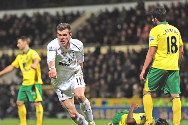 Gareth Bale wheels away in relief after scoring a late equaliser for Spurs