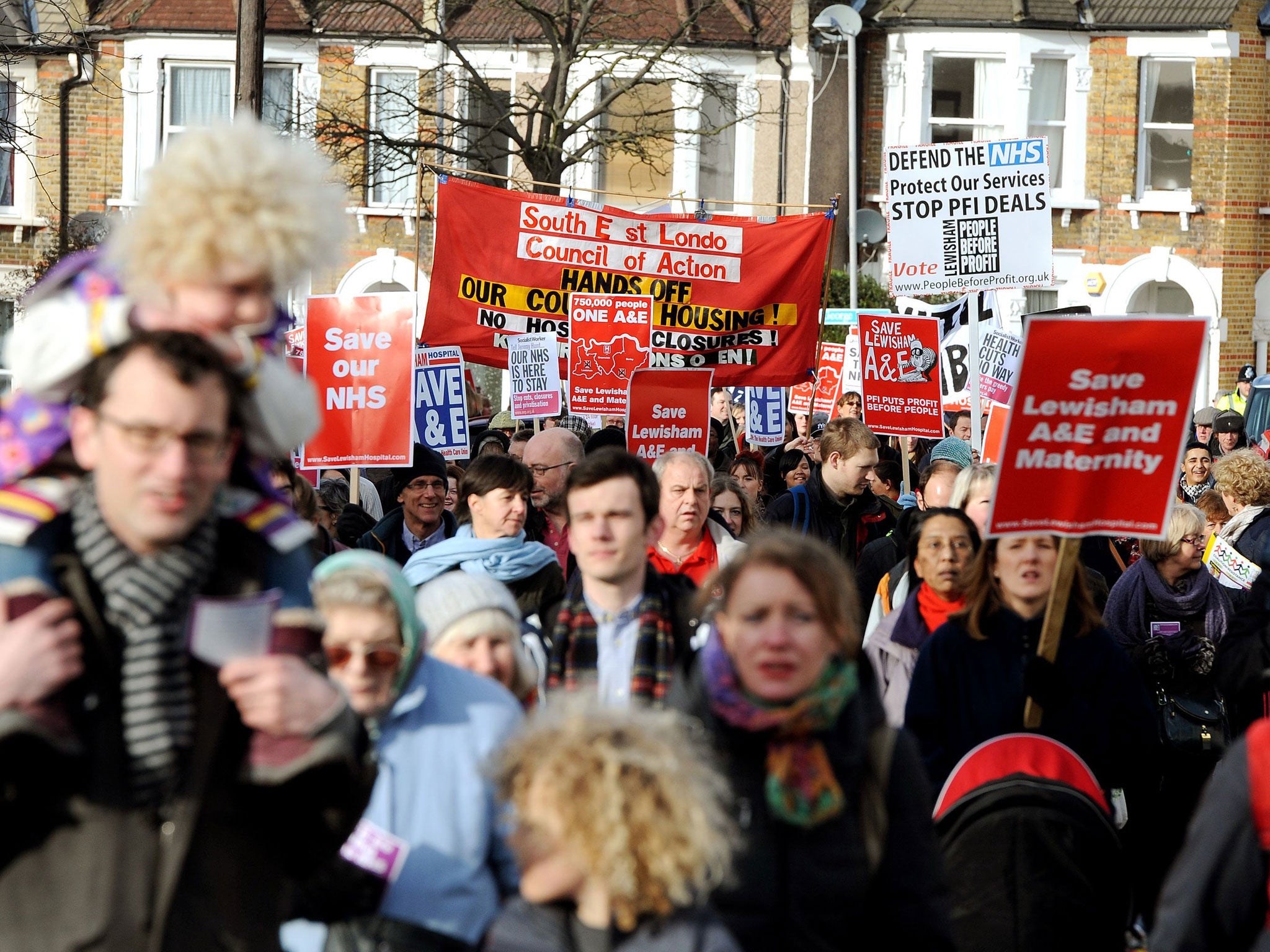 Protesters taking part in a demonstration against the closure of their local A&E and maternity services at Lewisham Hospital in south-east London