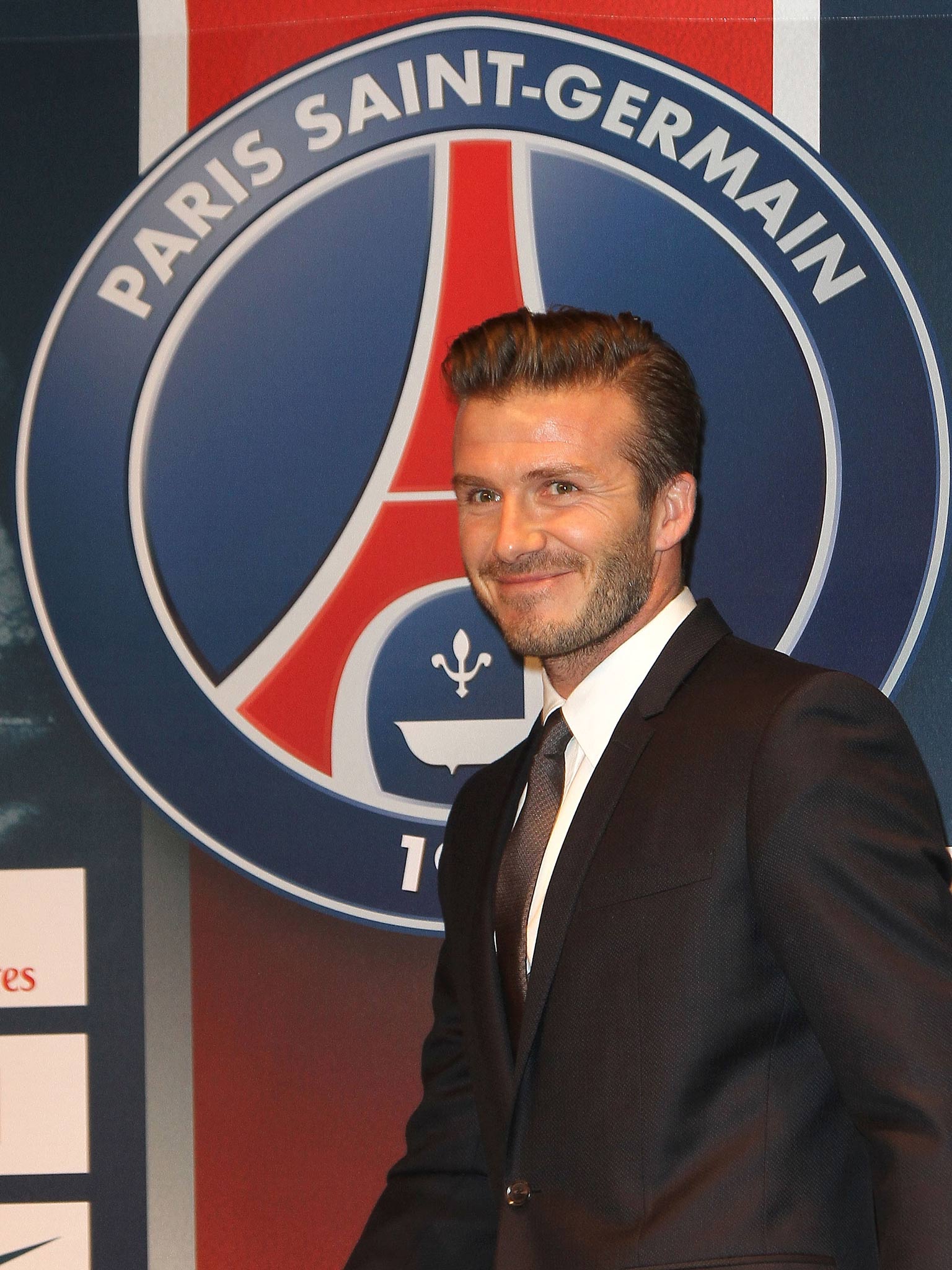 David Beckham addresses the media in Paris after completing his deal to PSG