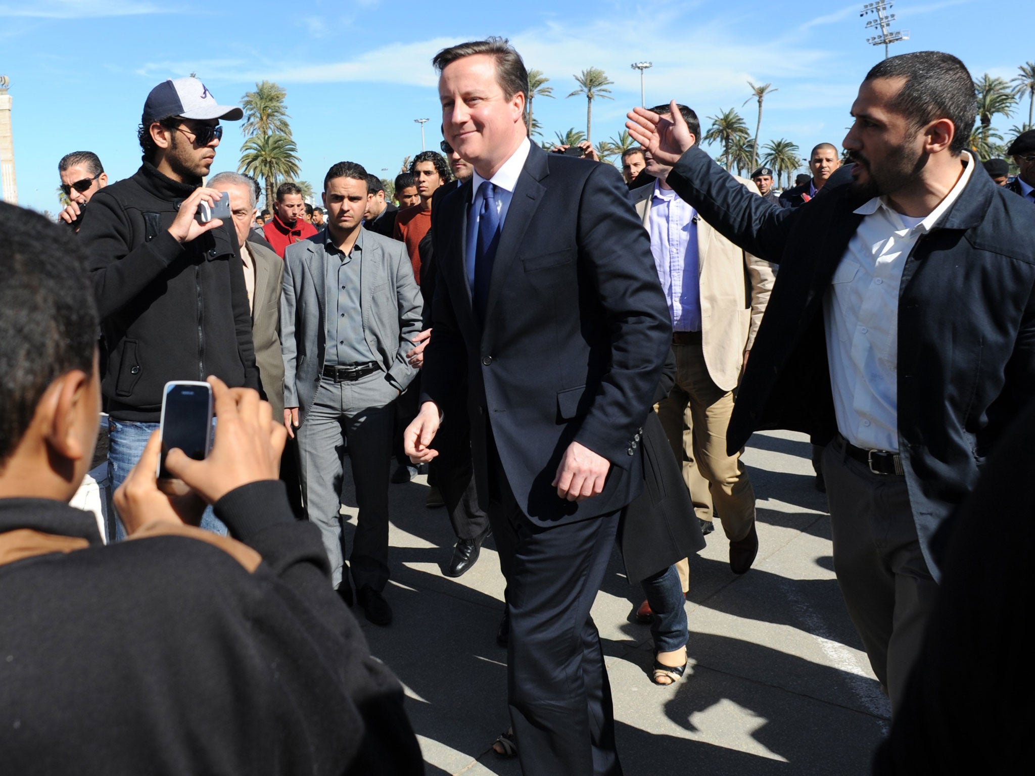 Prime Minister David Cameron takes a walk through Martyrs Square