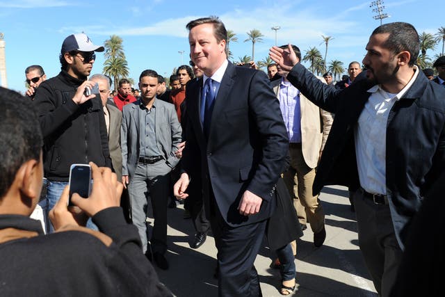 Prime Minister David Cameron takes a walk through Martyrs Square