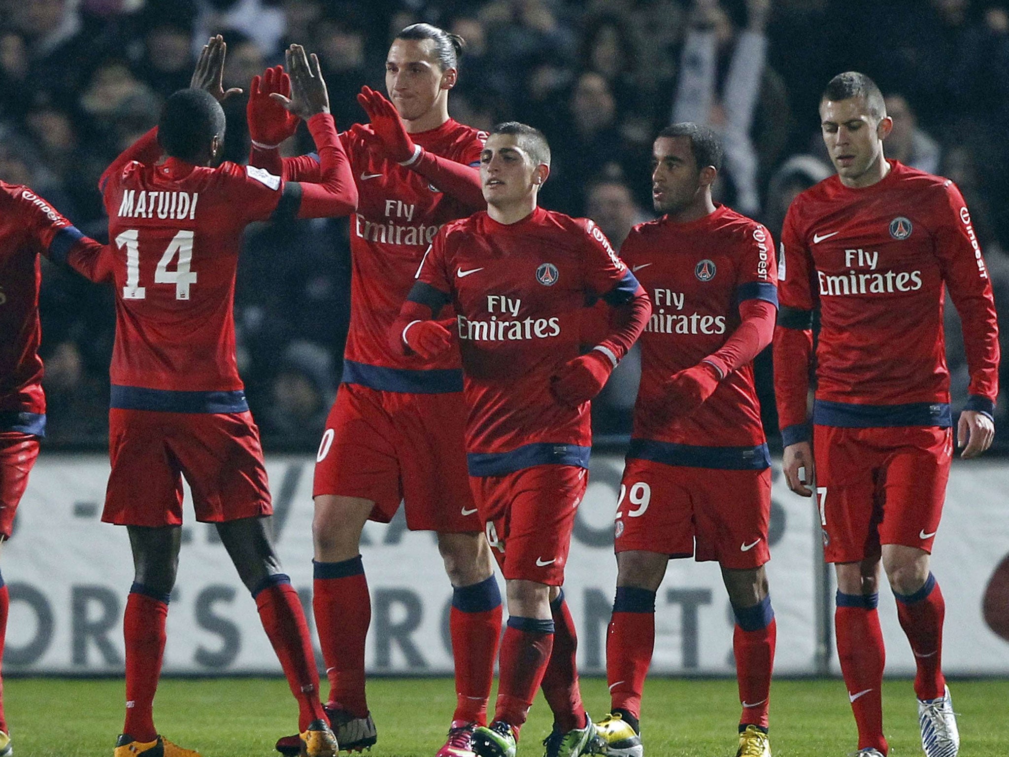 Zlatan Ibrahimovic (second left) celebrates with his team-mates